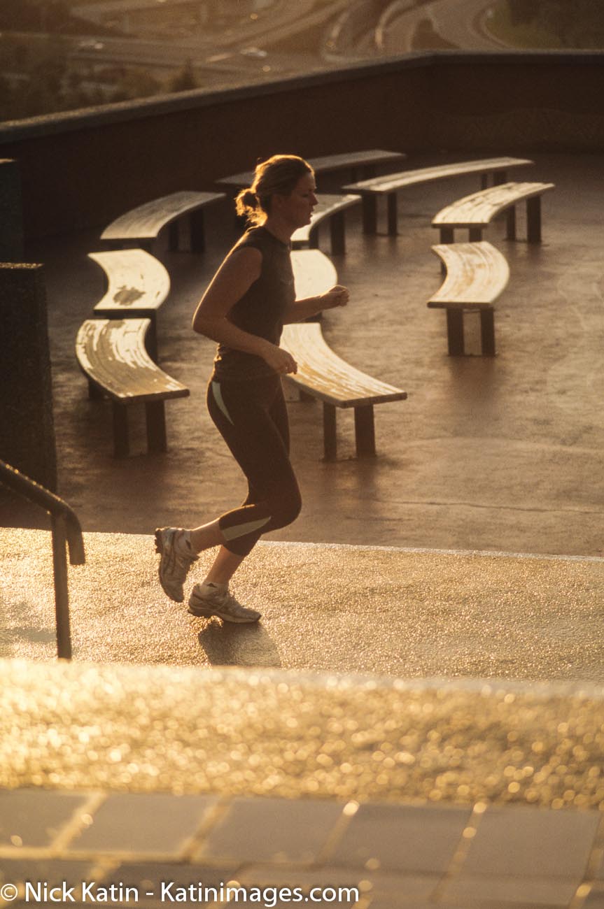 Jogger at Dusk in Kings Park Perth the biggest inner city park in the world and is very popular with joggers. This area overlooks the Perth CBD.