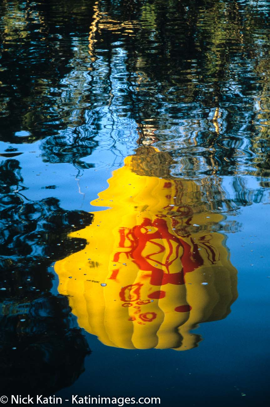 Yellow Balloon reflection on the Yarra river in Melbourne Australia
