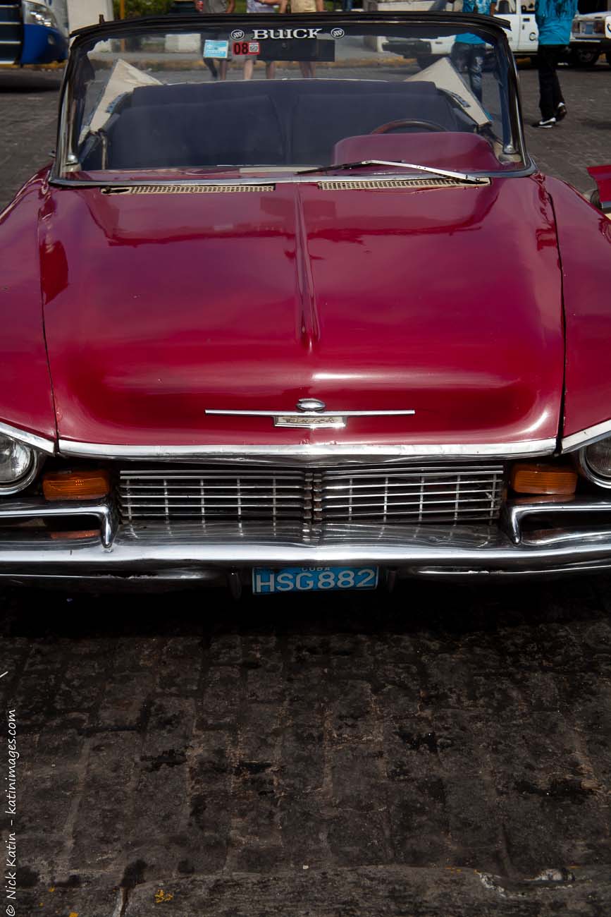 The front of a Red Buick, one of Havana's old classic cars