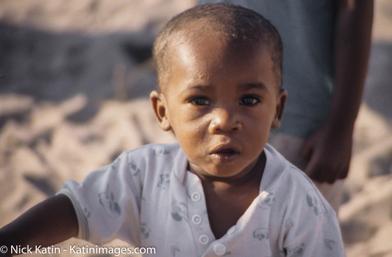 Young Boy looks at the camera in a small village in Botswana