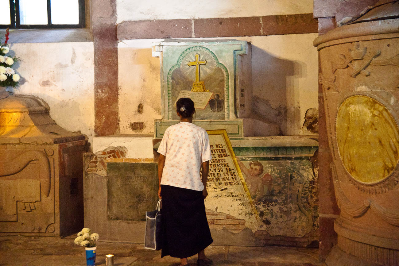 Women grieving in San Miguel de Allende's parroquia crypt